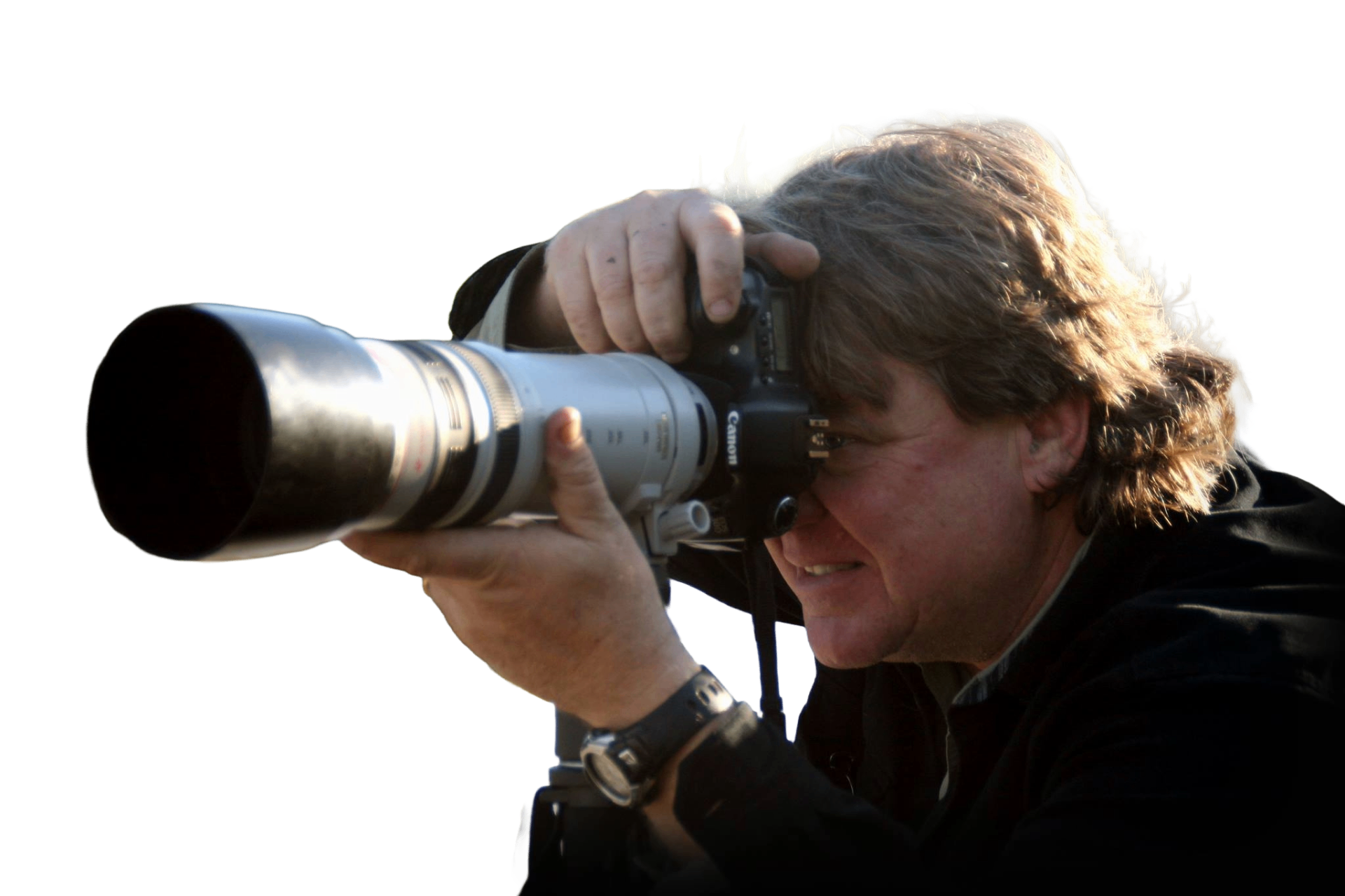Jim Harris with a camera and telephoto lens